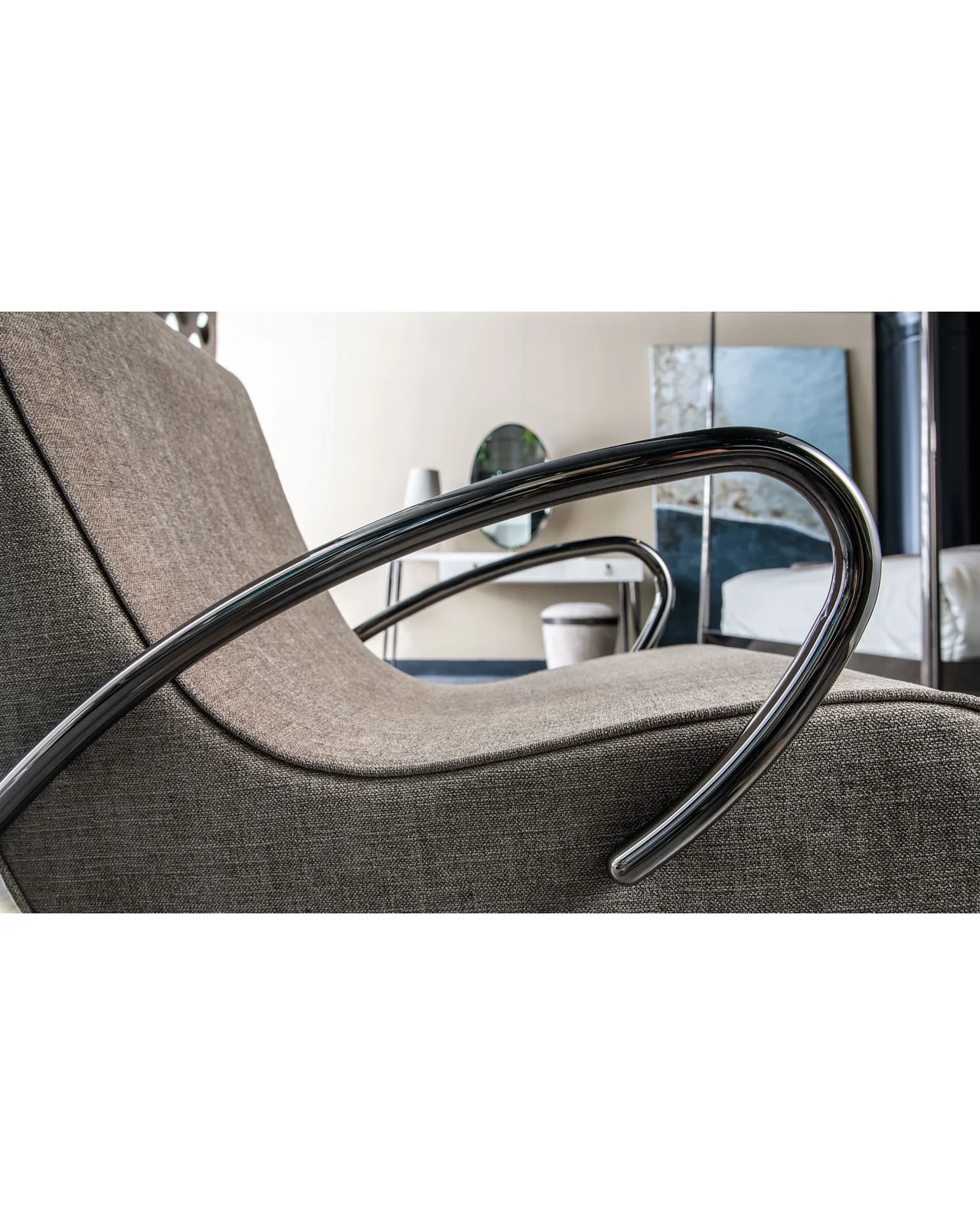 Camilla rocking armchair by Cantori, in an interior setting, photo 3 of 9