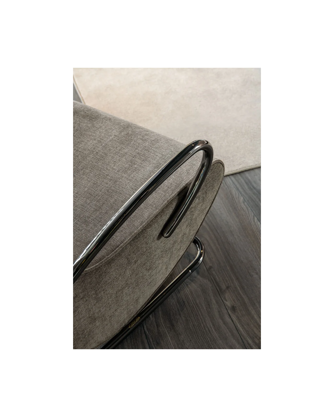 Camilla rocking armchair by Cantori, in an interior setting, photo 9 of 9